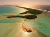 aerial photo of one foot island, aitutaki lagoon, south pacific