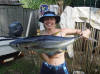 princess with a nice yellow fin tuna, aitutaki fishing